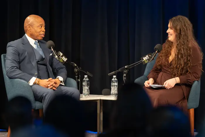 Mayor Eric Adams discusses his housing plan with WNYC and Gothamist editor Josefa Velásquez during an event Monday at the Greene Space.